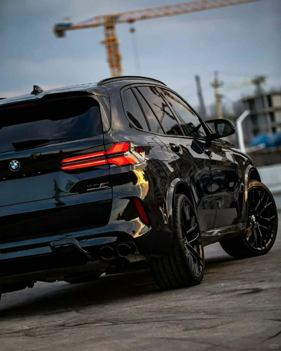 Black BMW X5 G05 completed rear three-quarter view