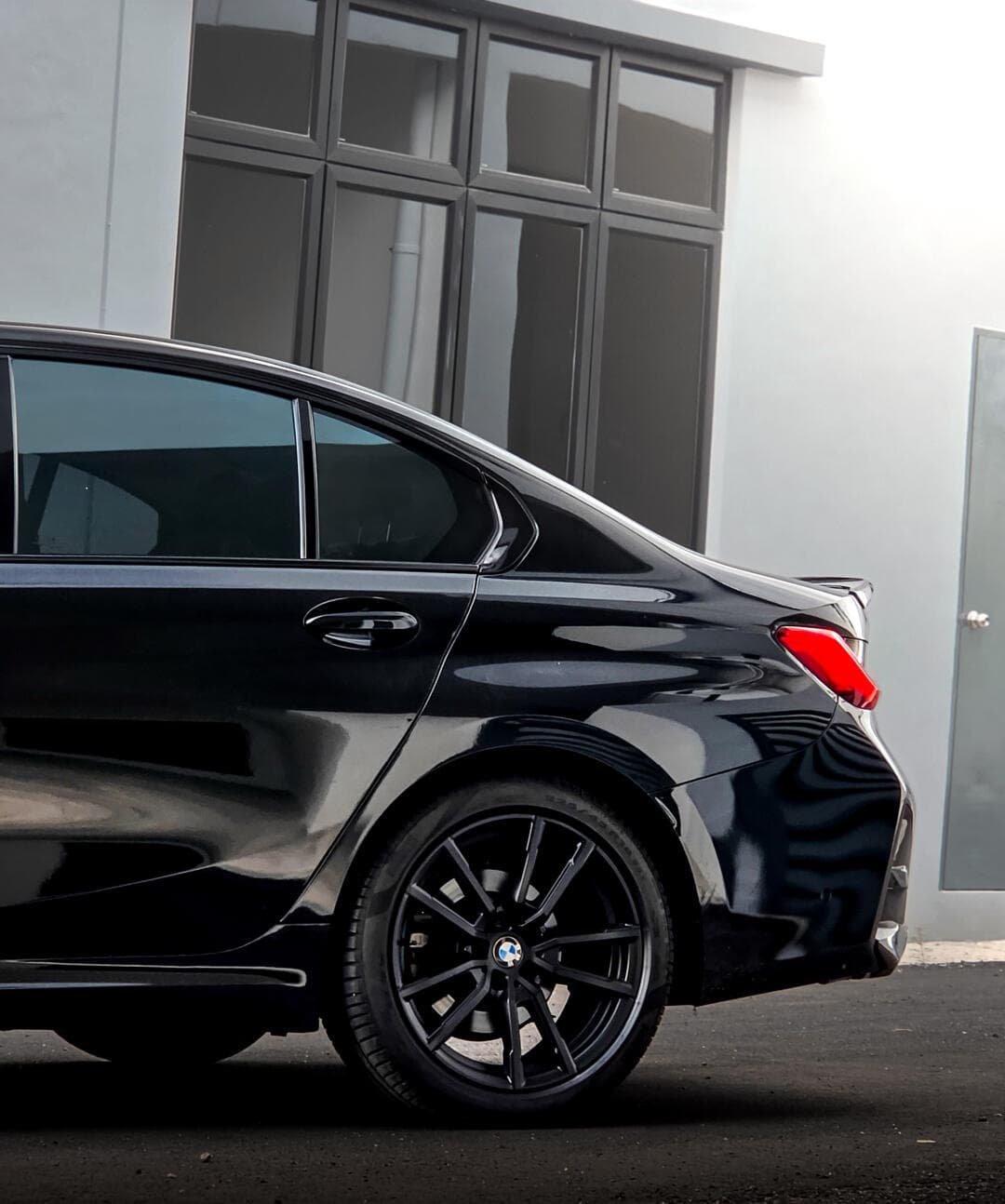 Black BMW G20 completed conversion from the rear side
