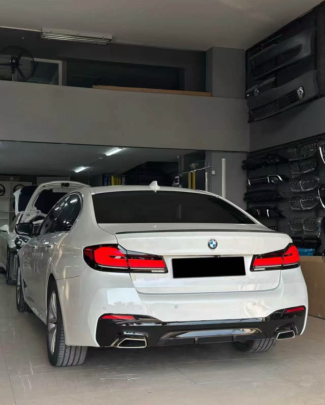 White BMW G30 completed rear conversion